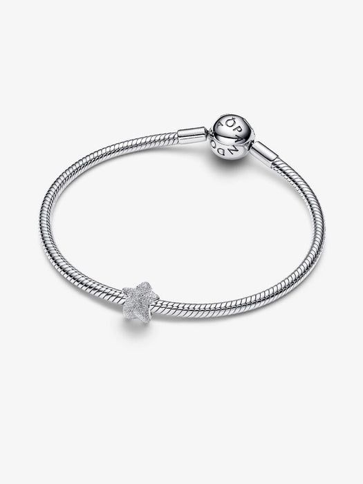 Pandora sterling silver snake chain bracelet featuring the textured star charm with logo clasp.