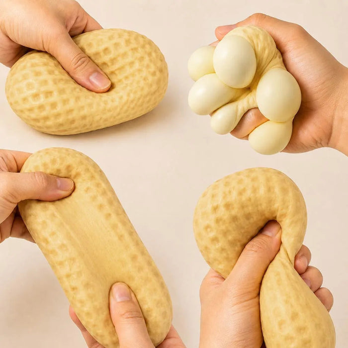Four hands holding different textured stress balls against a beige background