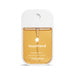 Touchland Spiced Pumpkin-Tini Power Mist hand sanitizer, 30 mL, in front of a whipped cream-topped drink.