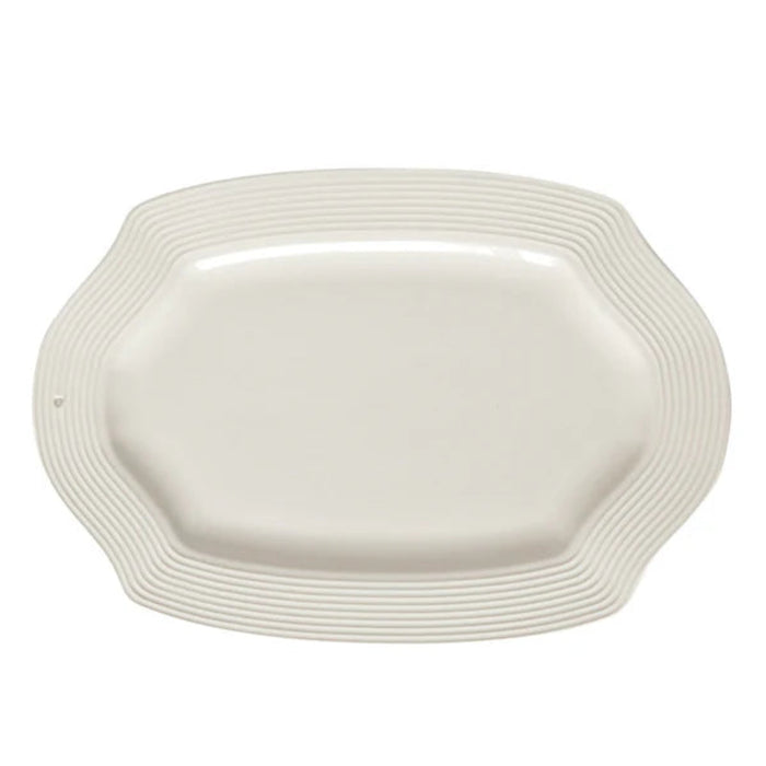 Nora Fleming White ceramic rectangle platter with wavy edge on a white background
