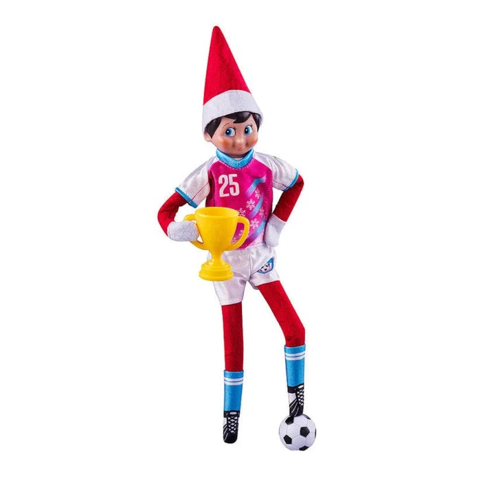 Elf on the Shelf character in sports-themed outfit with trophy and soccer ball on white background