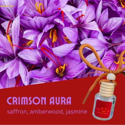Purple flowers with a bottle labeled 'Crimson Aura' on a red background
