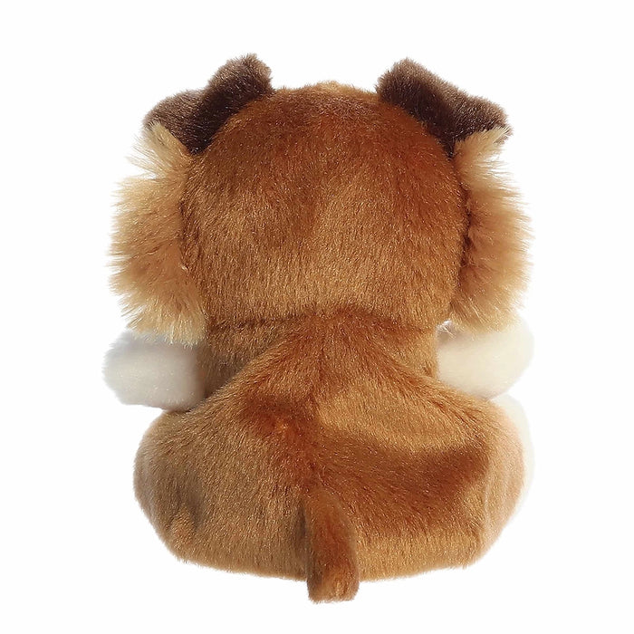 Back view of Palm Pals Fia Sheltie plush highlighting fluffy tail and soft texture