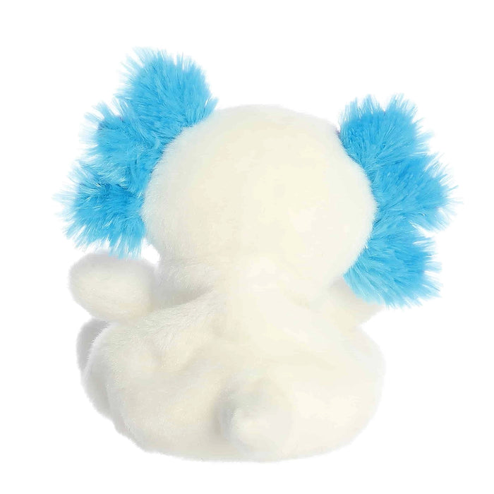Back view of Palm Pals Fia Sheltie plush highlighting fluffy tail and soft texture