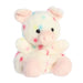Palm Pals Patsy Funfetti Pig stuffed animal angled view with cute pig face and soft texture
