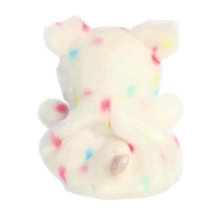 Back view of Palm Pals Patsy Funfetti Pig plush highlighting pastel colors and tiny tail