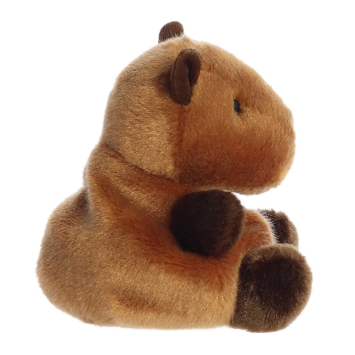 Side profile of Palm Pals Sid Capybara plush with small ears and plush paws