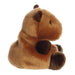 Side profile of Palm Pals Sid Capybara plush with small ears and plush paws