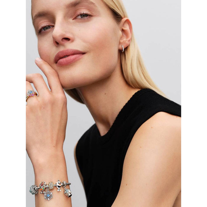 Pandora Disney Frozen Elsa tiara ring worn on finger with blue crystal centerpiece and sparkling sterling silver band