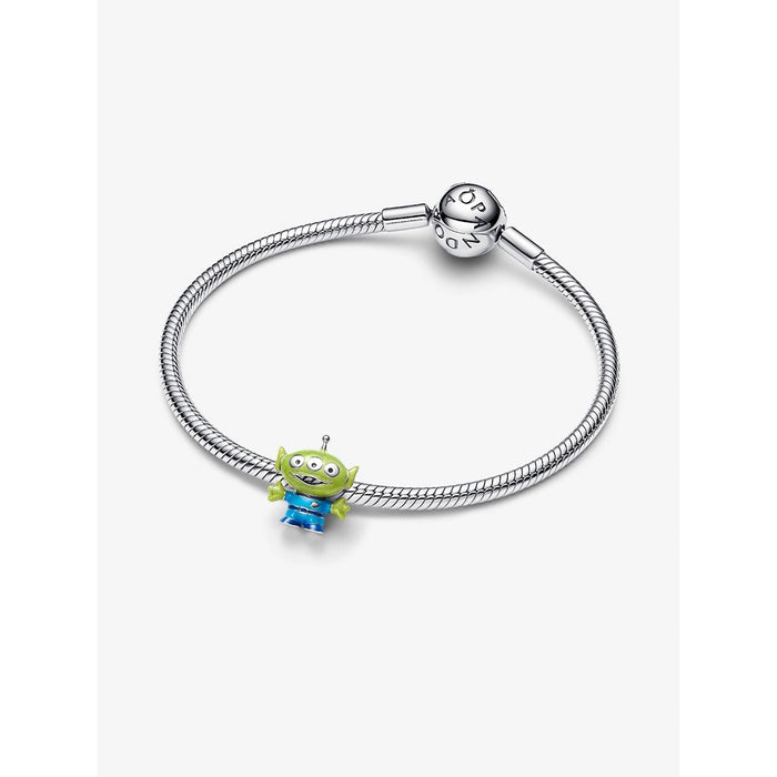 Pandora Disney Pixar Toy Story Alien Charm styled on a silver Pandora Moments bracelet, highlighting its playful enamel design.