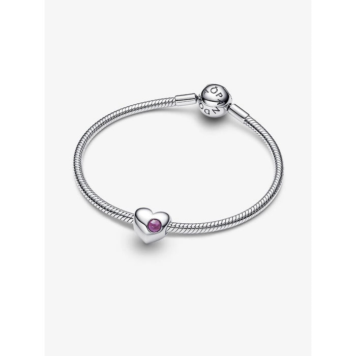 Close-up of Pandora Engravable Purple Stone Heart Charm on silver bracelet.
