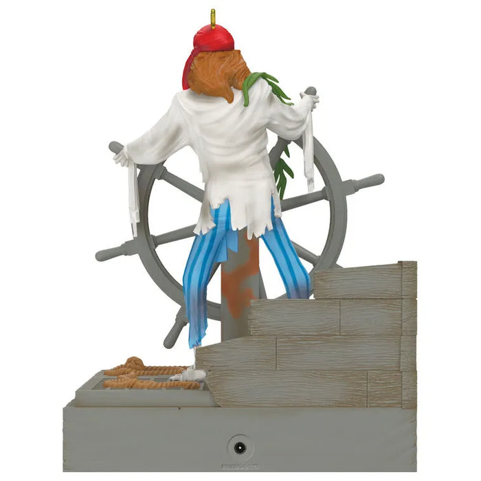 Rear view of Hallmark Disney Pirates Helmsman Skeleton ornament showing gold hanging hook and deck base