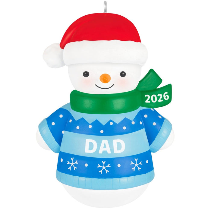 Front of 2026 Hallmark Keepsake Dad snowman ornament with red hat and green year-dated scarf