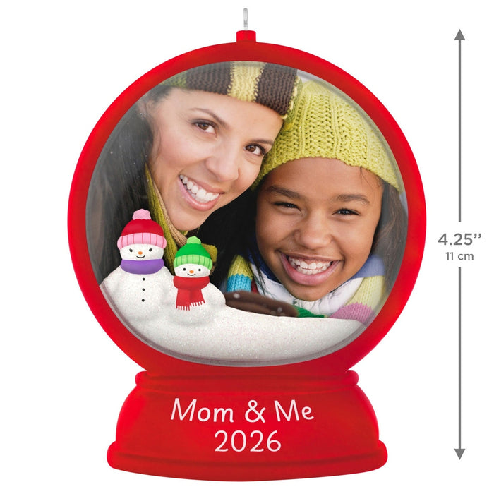 Red plastic Mom and Me 2026 snow globe ornament with 4.25 inch height measurement on white background