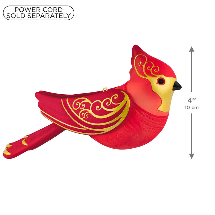 4 inch red plastic cardinal ornament side profile with power cord sold separately label