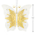 Butterfly-shaped decorative item with gold detailing on a white background