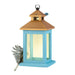 Side view of Marjolein Bastin lantern ornament showing MB monogram and bird detail