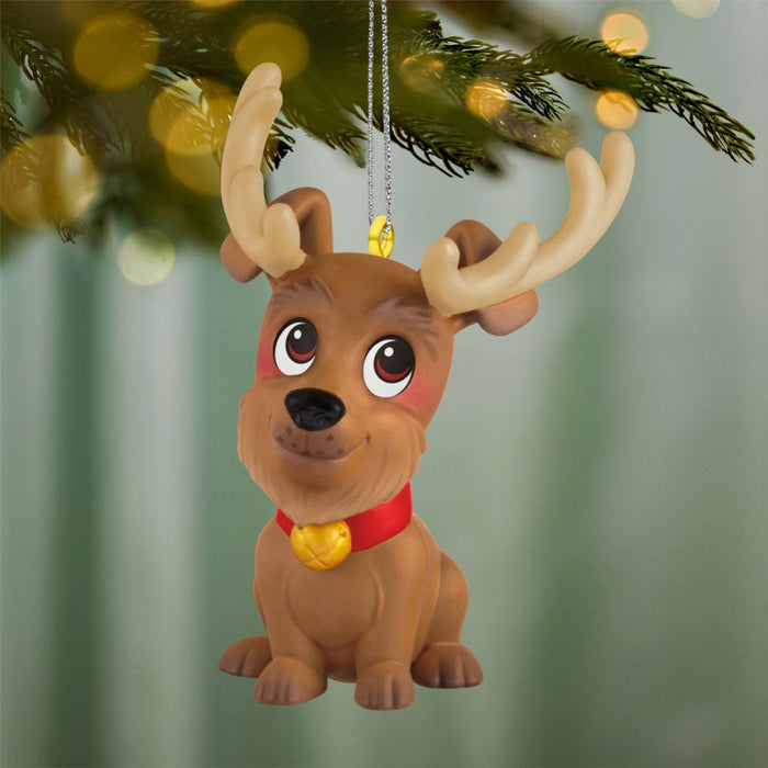 Dog-shaped reindeer ornament with a red collar and gold tag, hanging from a Christmas tree.