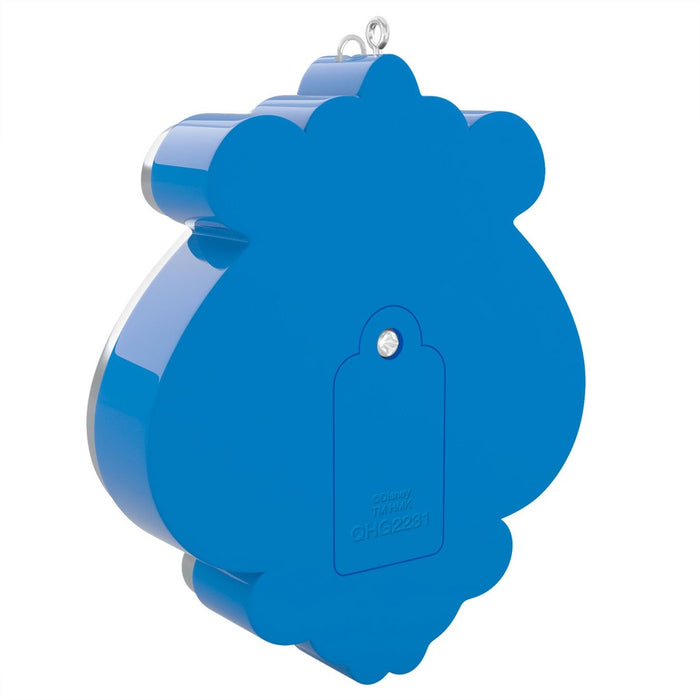 Back of glossy royal blue Cinderella pumpkin coach ornament with silver trim and embossed Disney copyright label