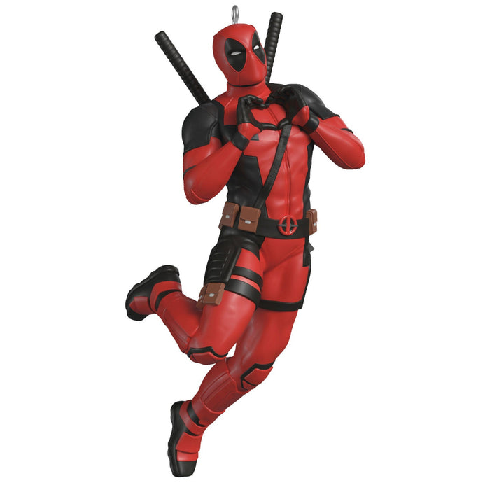 Deadpool action figure in red and black costume on a white background