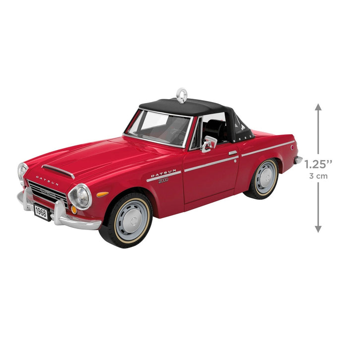 Side profile of red 1968 Datsun 2000 Sports ornament with gold rim wheels and 1.25 inch height graphic