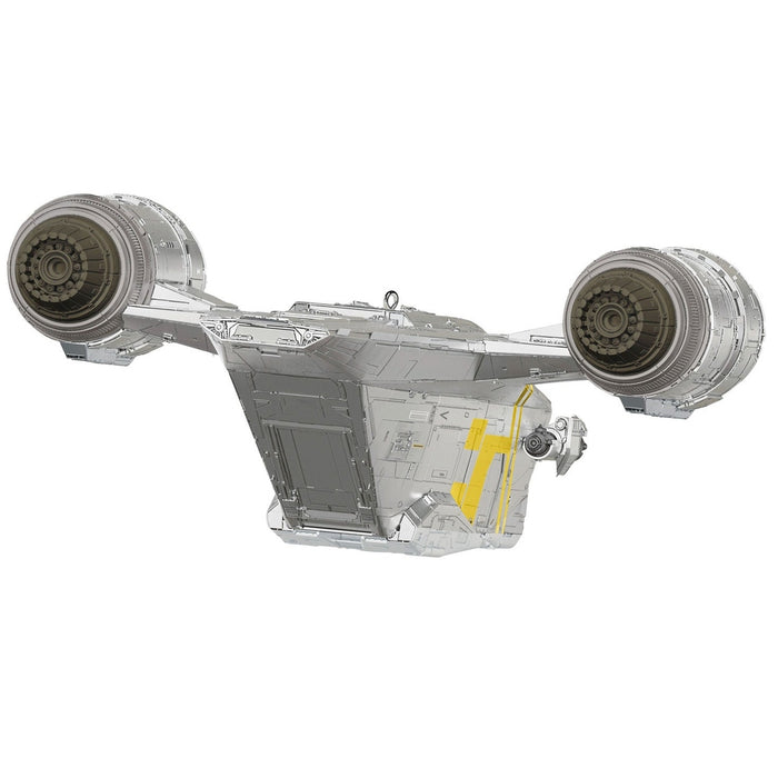 Front profile of 1.75 inch tall Star Wars Razor Crest ornament with yellow wing panels and black cockpit