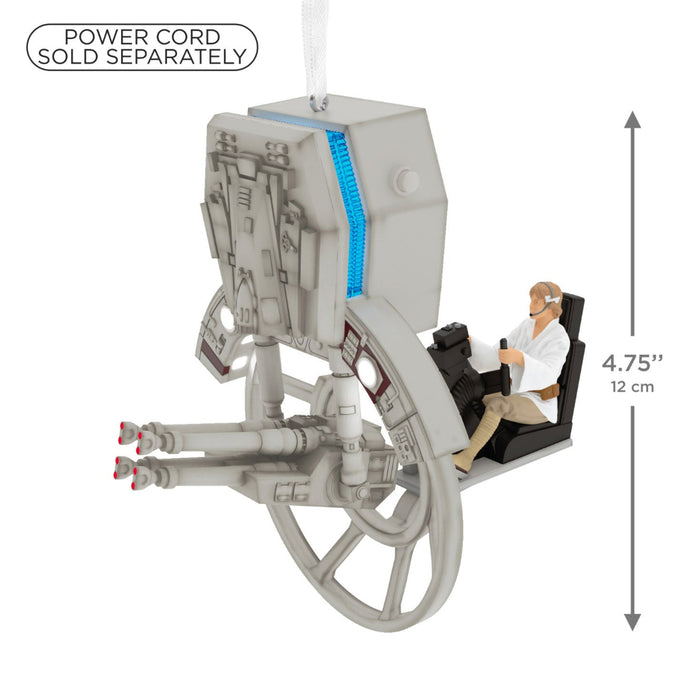 Toy vehicle with a figure inside, dimensions indicated, power cord sold separately text.