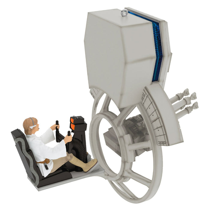 Toy figure of a pilot inside a spaceship with a white background