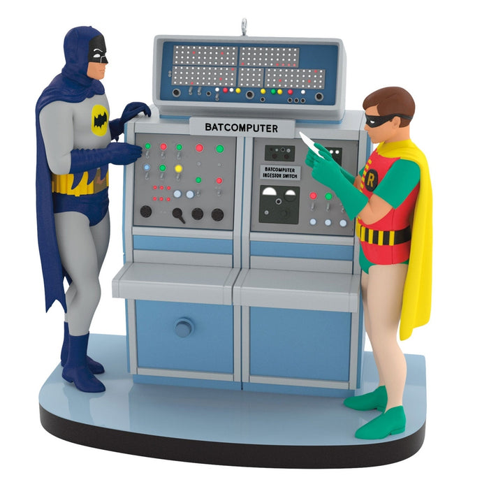 Front view of 2026 Hallmark Batman Batcomputer ornament showing retro console details and character figurines without measurement graphic
