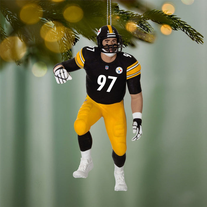 Steelers Cameron Heyward Christmas tree ornament hanging on pine branch with lights