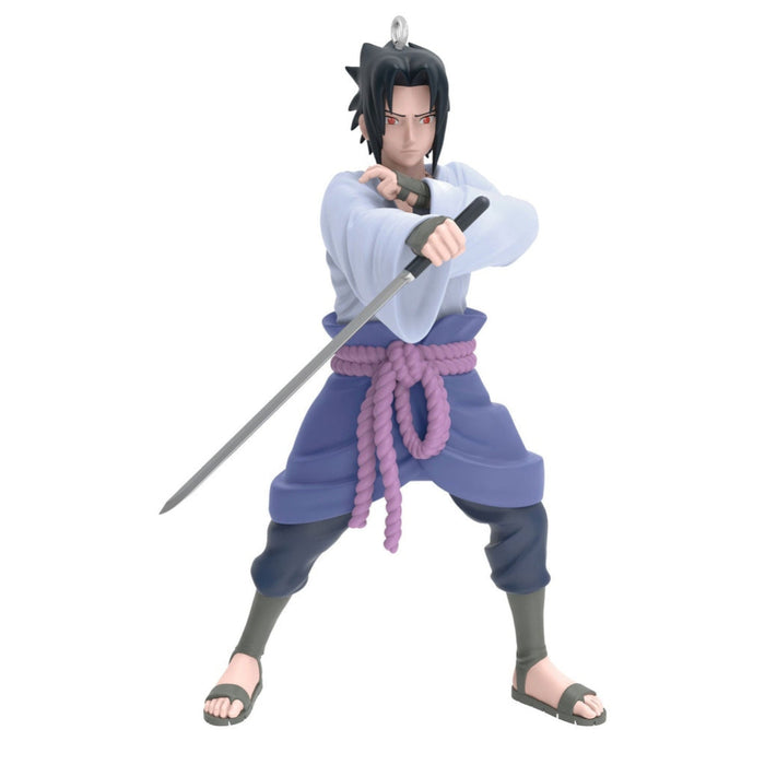 Anime character figurine holding a sword on a white background