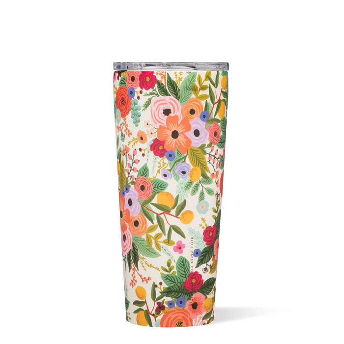 A floral tumbler featuring a vibrant, colorful design with various flowers and patterns.