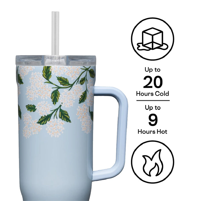A blue tumbler adorned with a white floral pattern and equipped with a straw for easy sipping.