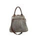 The Myra Bag Gerster Shoulder Bag features upcycled woven canvas with rich genuine leather accents. 