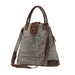 The Myra Bag Gerster Shoulder Bag features upcycled woven canvas with rich genuine leather accents. 