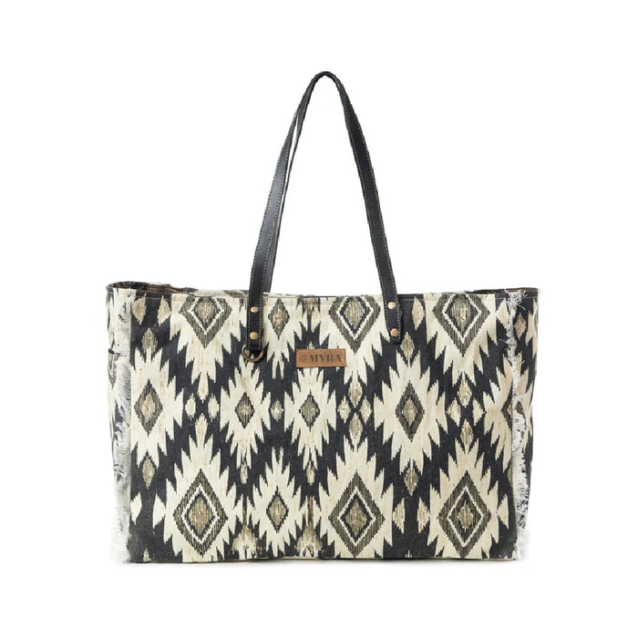 Large tote bag featuring a striking black and white tribal print design.