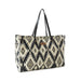 Spacious tote bag adorned with a bold black and white tribal pattern.
