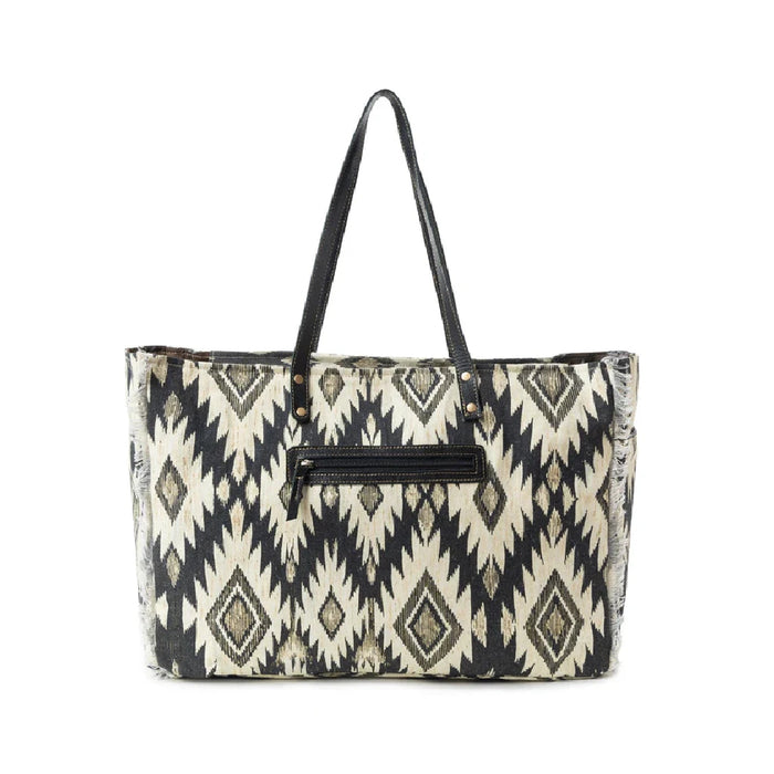 Large tote bag showcasing an eye-catching black and white tribal print.