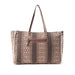 A brown and white tote bag with an intricate pattern, perfect for carrying essentials while adding a touch of style.