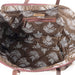 A stylish tote bag in brown and white, adorned with a distinctive pattern, great for shopping or daily activities.