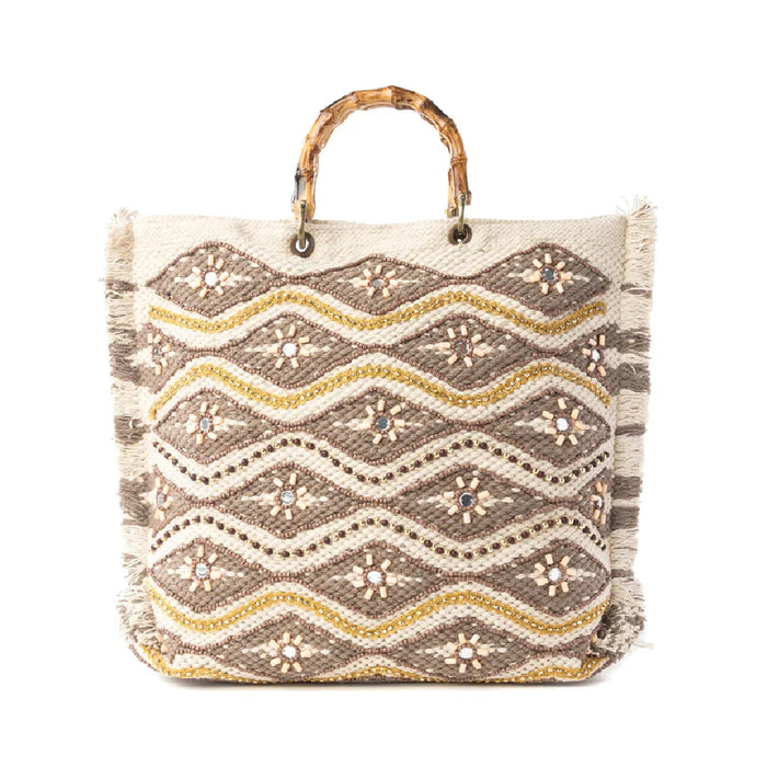 Woven tote bag featuring a geometric pattern with gold accents, showcasing a stylish and modern design.