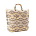 Stylish woven tote bag adorned with geometric shapes and gold accents, perfect for casual outings.