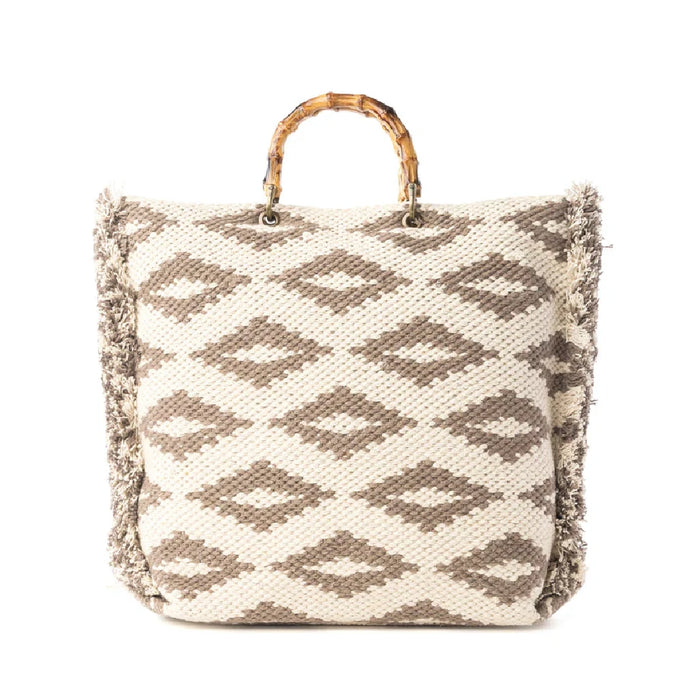 Geometric-patterned woven tote bag with elegant gold accents, combining functionality and fashion.