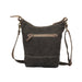 Stylish paisley print leather bag with a brown strap, ideal for both casual and formal occasions.