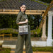 Floral canvas bag featuring a brown strap and a leather shoulder strap, perfect for everyday use and fashion.