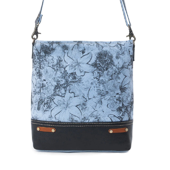 Blue floral print leather bag with a matching leather strap, showcasing a stylish and elegant design.