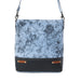 Blue floral print leather bag with a matching leather strap, showcasing a stylish and elegant design.