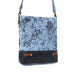 Elegant blue floral leather bag featuring a leather strap, perfect for adding a touch of style to any outfit.