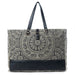 This Myra Carmela Weekender Bag brings together vintage Western charm and practical travel style