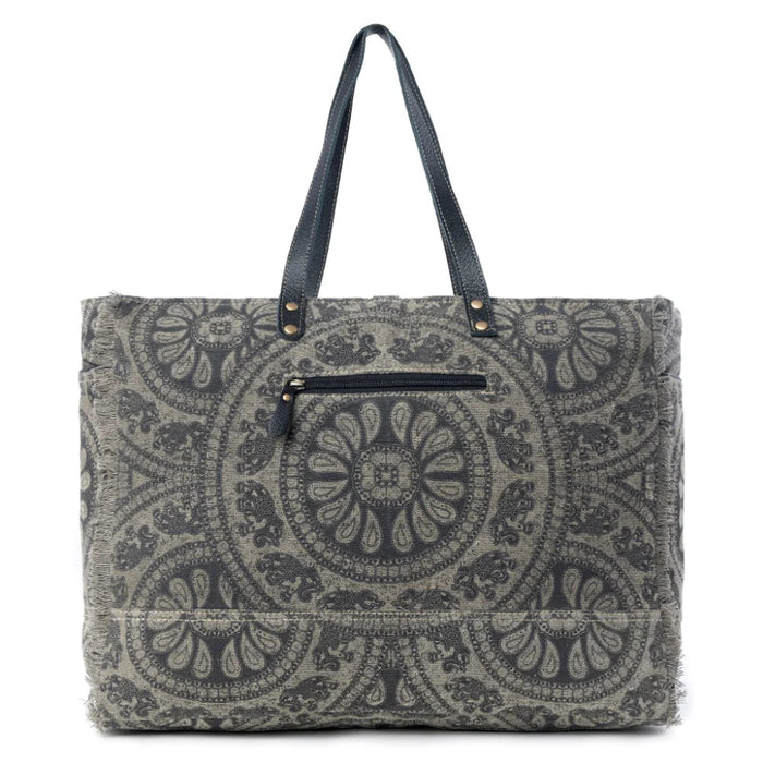 This Myra Carmela Weekender Bag brings together vintage Western charm and practical travel style
